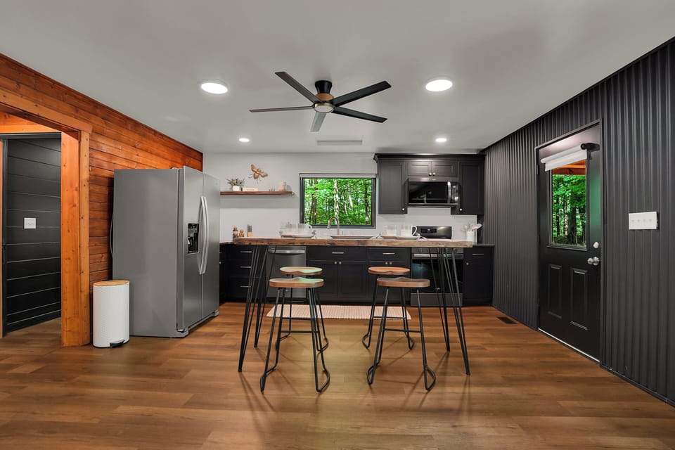 This beautiful kitchen is stocked with the utensils you will need.