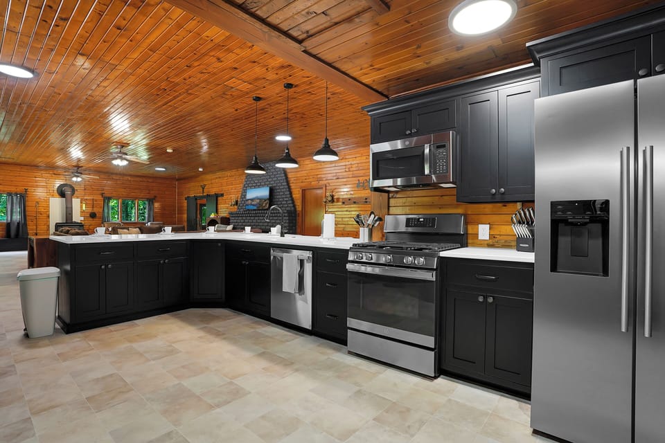 This beautiful kitchen is stocked with the utensils you will need.