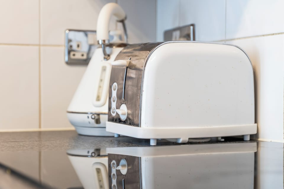 Modern kitchen with toaster and kettle for easy morning routines