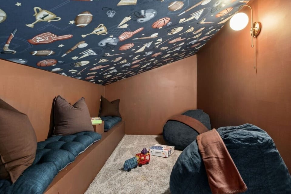 Kids can claim their own cozy hideaway—a playful spot for games, lounging, reading, and a little downtime.