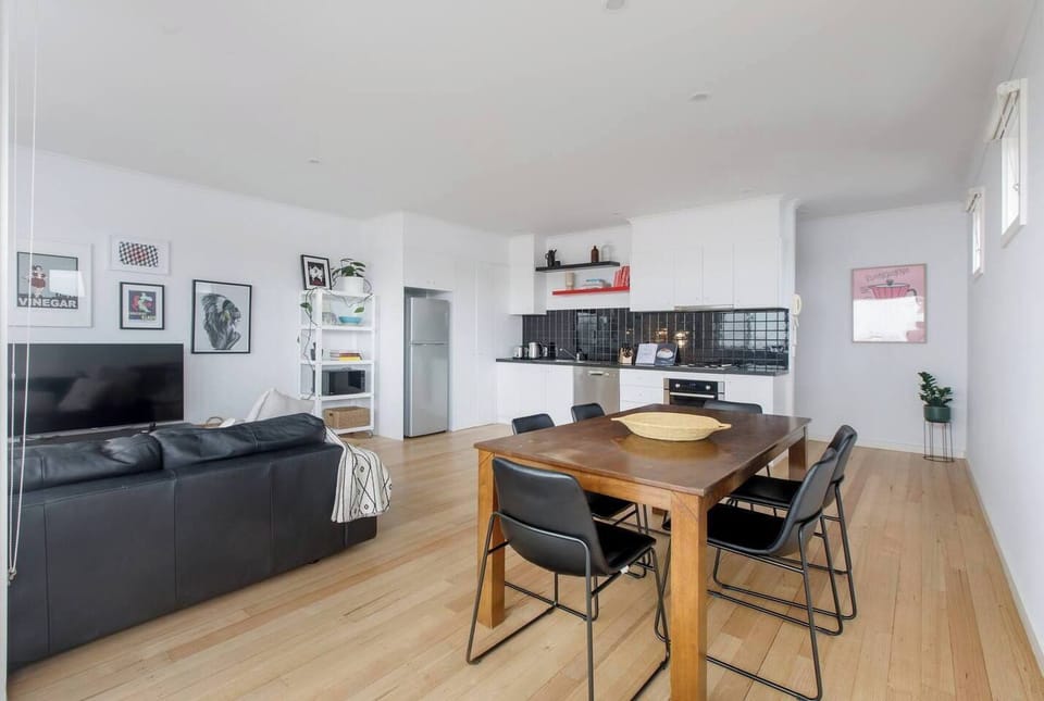 The open plan living and dining area encompasses the upper floor with ample space for groups.
