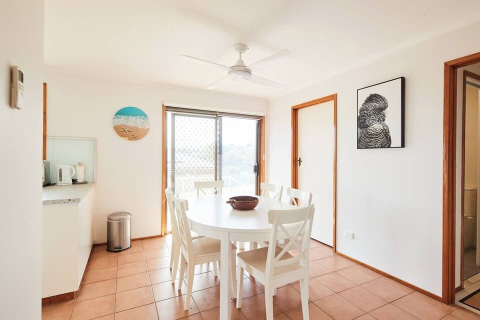 With direct access to the patio, the dining area is perfect for enjoying meals indoors or transitioning seamlessly to outdoor relaxation.