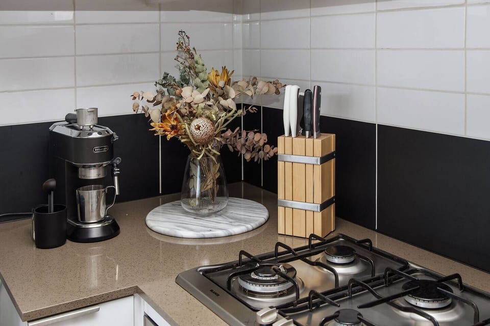 It offers all the essentials, plus additional conveniences including a sandwich press, dishwasher and espresso machine.

