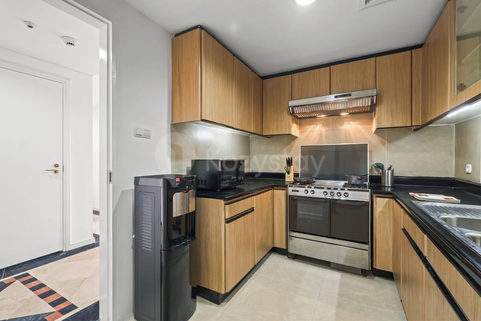 Apartment, 2 Bedrooms, City View | Private kitchen | Full-size fridge, microwave, stovetop, cookware/dishes/utensils