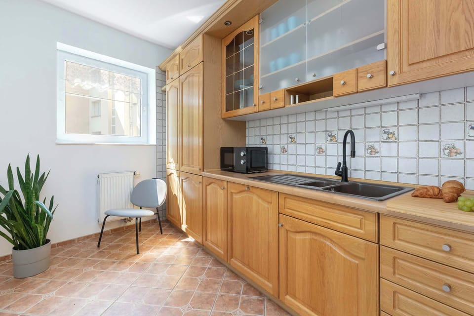 Cook and dine in style with the modern kitchenette and dining area.