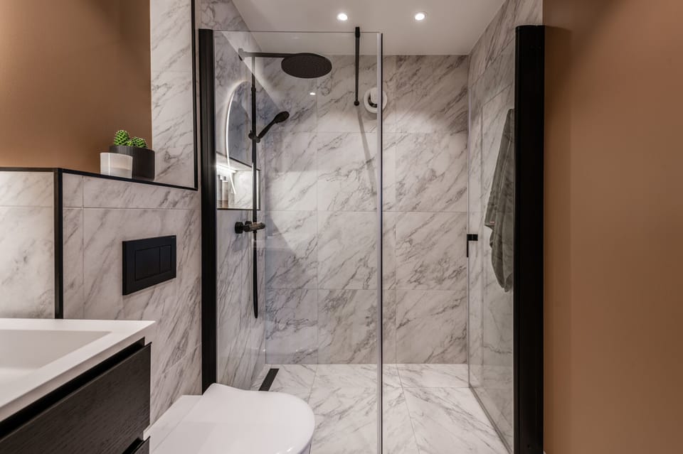 Renovated and modern bathroom with premium rain shower