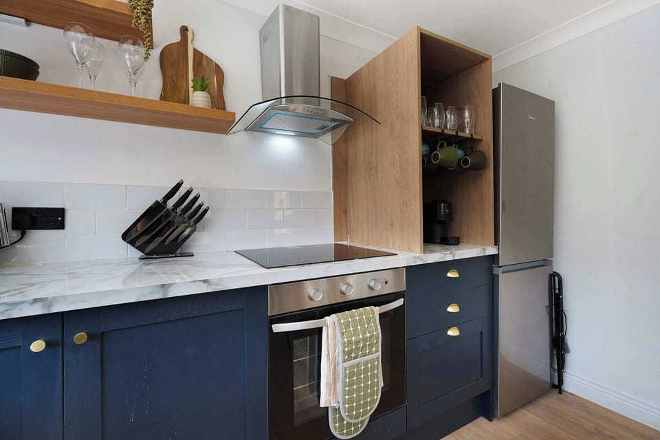 Everything you need for self-catering is provided, including an oven, hob, microwave, fridge/freezer, washing machine, breakfast table, and essential cookware for comfortable everyday dining.