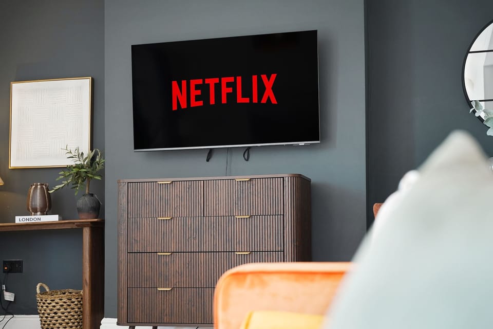 Enjoy a bright and inviting living room featuring comfortable seating, a Smart TV, free high-speed Wi-Fi, and a dining area. It's the perfect place to relax, share meals, or unwind after a day of exploring or work.