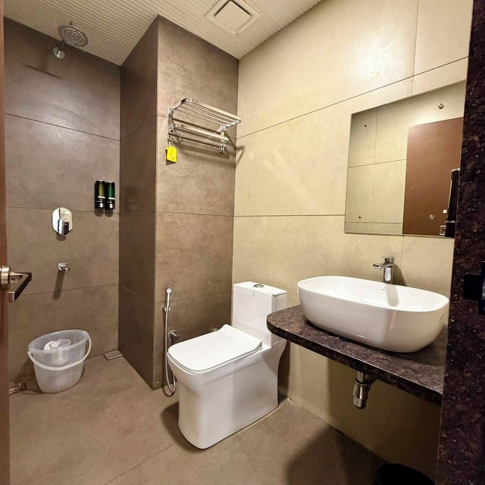 Shower, slippers, towels, soap