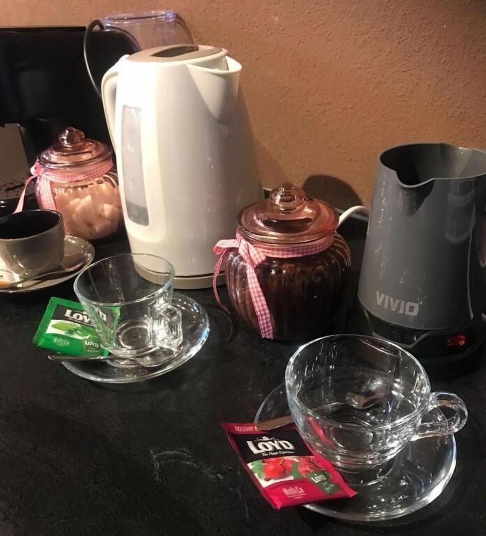 Superior Quadruple Room, City View | Food and drink