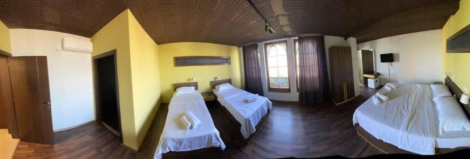 Superior Quadruple Room, City View | Desk, laptop workspace, WiFi (free)