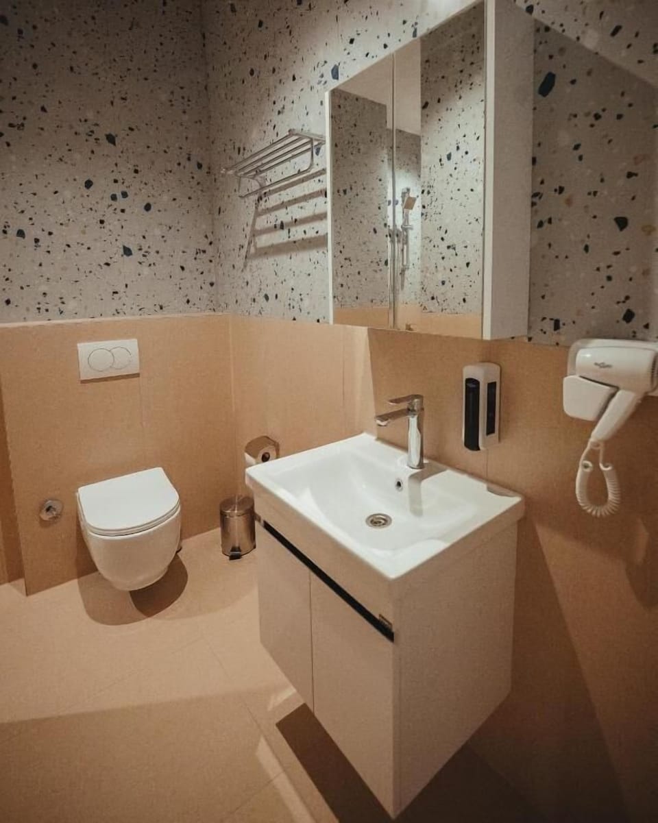 Hair dryer, towels, soap, shampoo