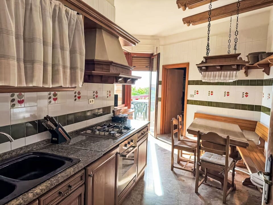 Wood, Kitchen, Furniture, Interior Design, Countertop, Flooring, Cabinetry, Floor, Wood Stain, Home