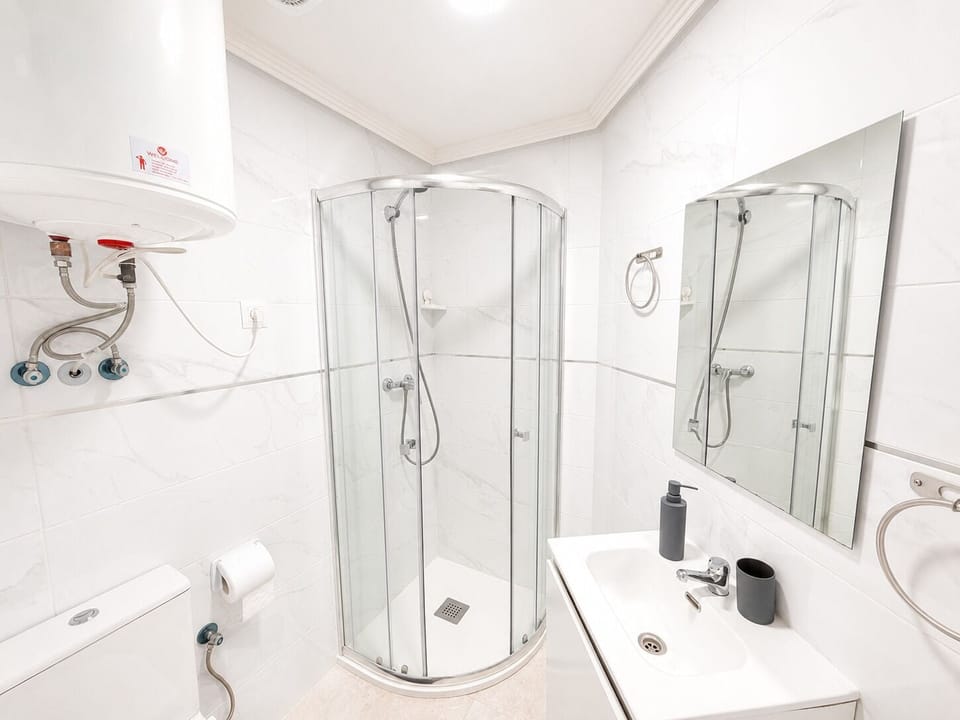 Shower, towels, soap, shampoo