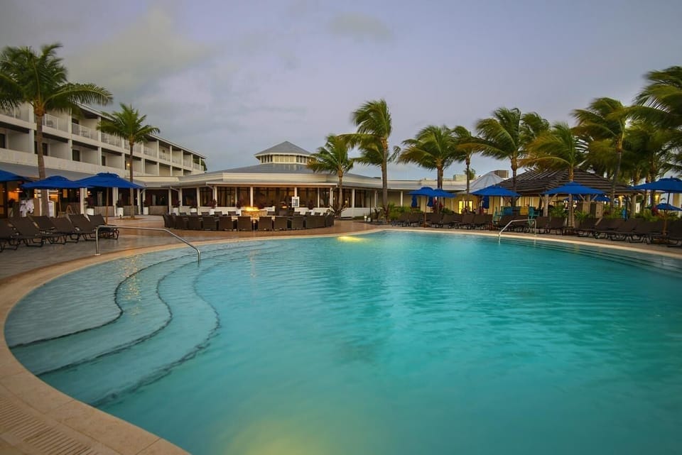 Spend the day poolside with ocean breezes and loungers.
