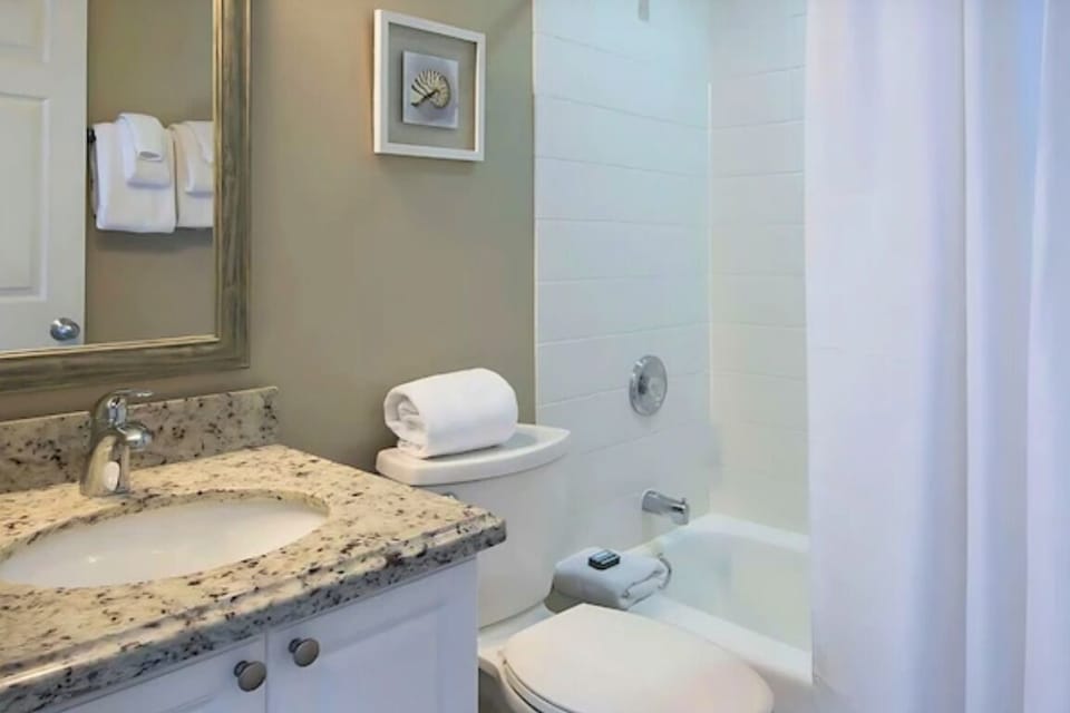 Refresh effortlessly in the clean bath with tub-shower combo.