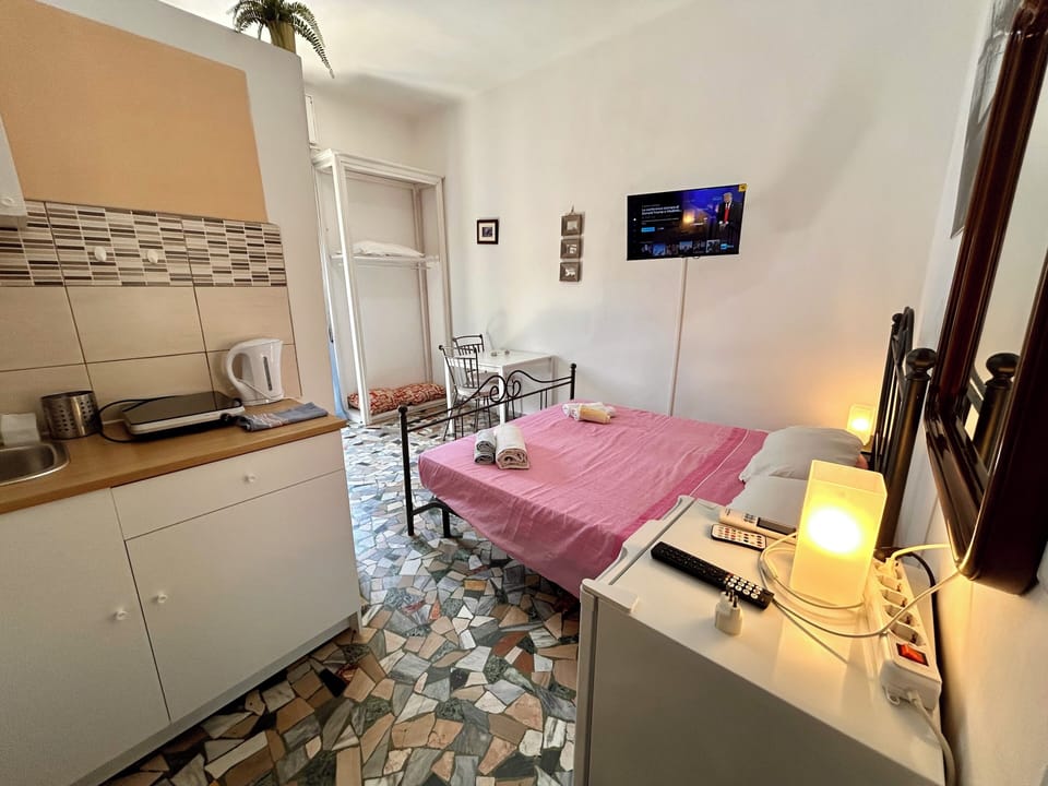 Classic Apartment, Balcony, City View | Minibar (free items), blackout drapes, soundproofing