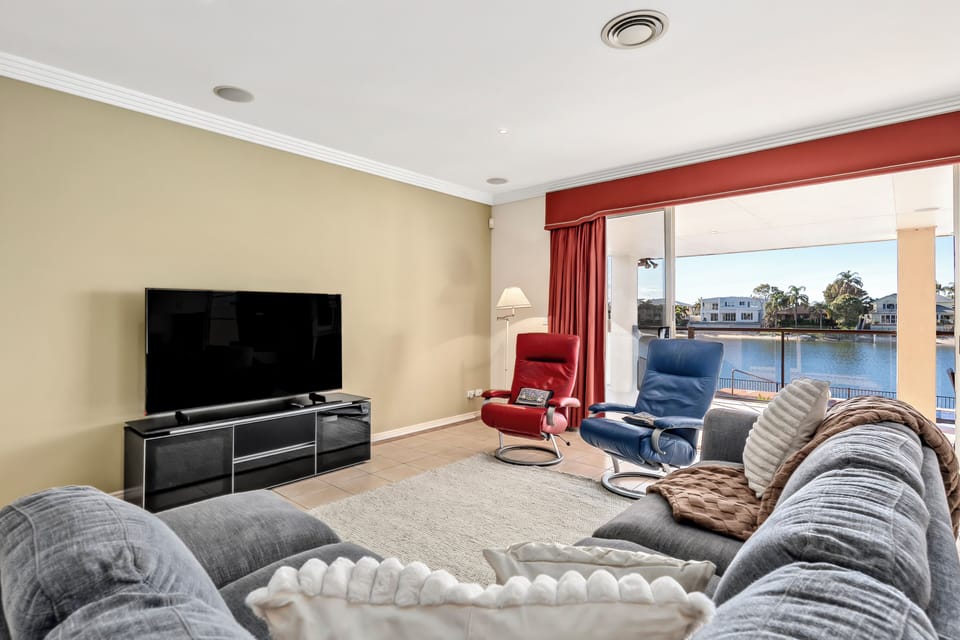 Settle in for movie night in the second living area, where a large sofa, recliner chairs and HD TV create a cosy spot to unwind with your favourite film.