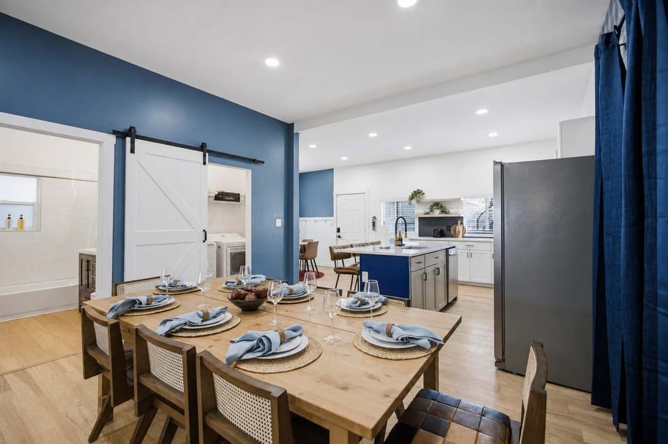 A table set and ready — guests can gather for home-cooked meals just steps from the fully equipped kitchen.