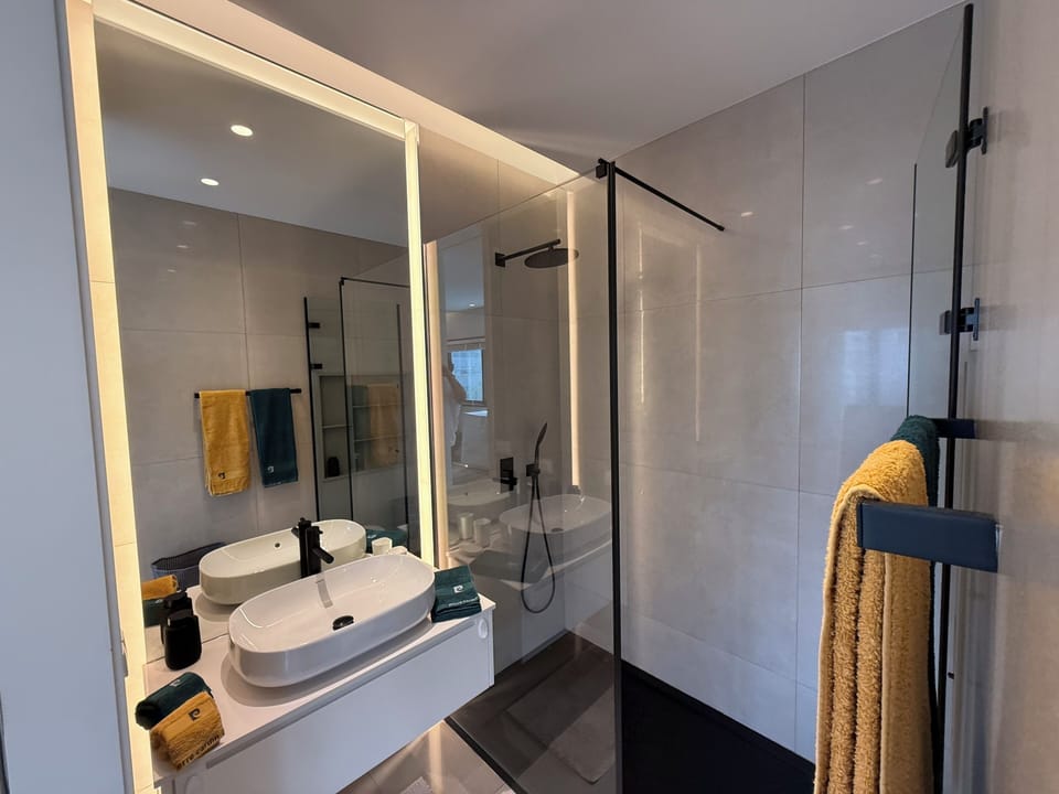 Superior Studio, Kitchenette, City View | Bathroom | Shower, hair dryer, soap, shampoo
