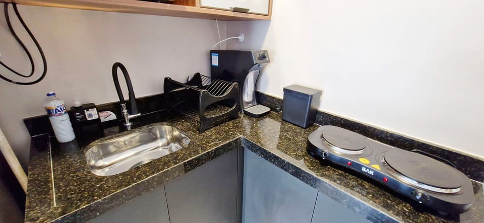 Apartment | Private kitchen | Fridge, microwave, cookware/dishes/utensils