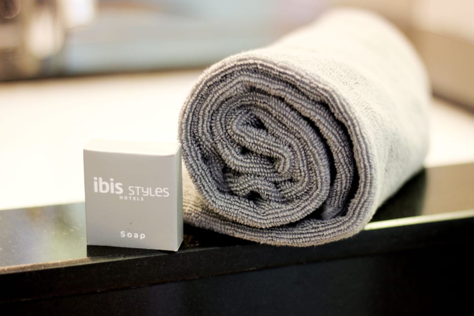 Shower, eco-friendly toiletries, hair dryer, slippers