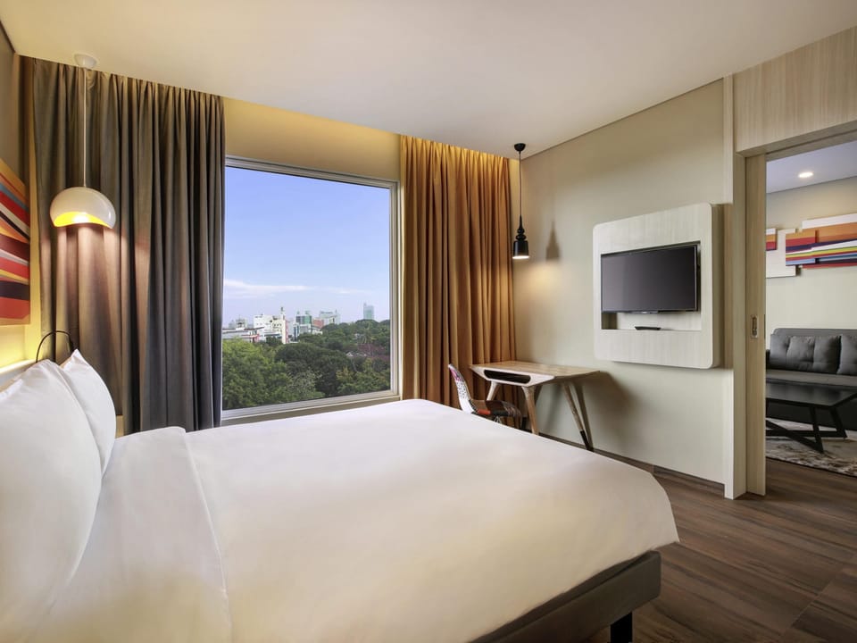 Family Room, 1 Double Bed with Sofa bed | Minibar (some free items), in-room safe, desk, soundproofing