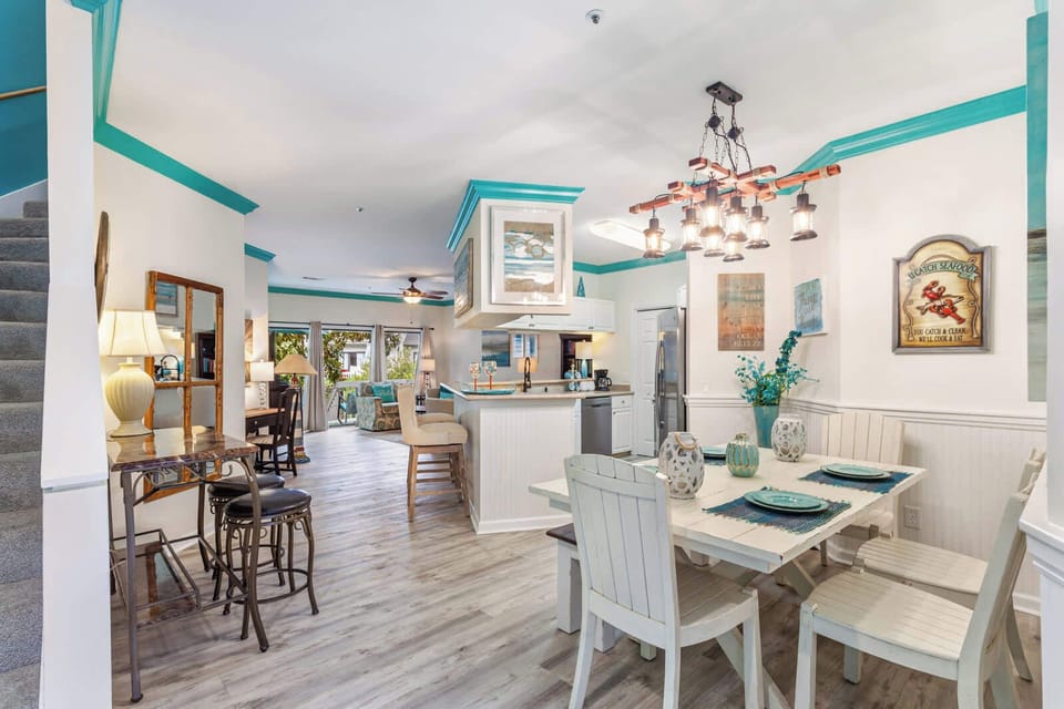 Coastal charm meets modern comfort at 35 Ocean Breeze! Teal accents, white shiplap & nautical lanterns set the mood for your perfect HHI escape. Gather, dine & make memories steps from the shore. 🌊