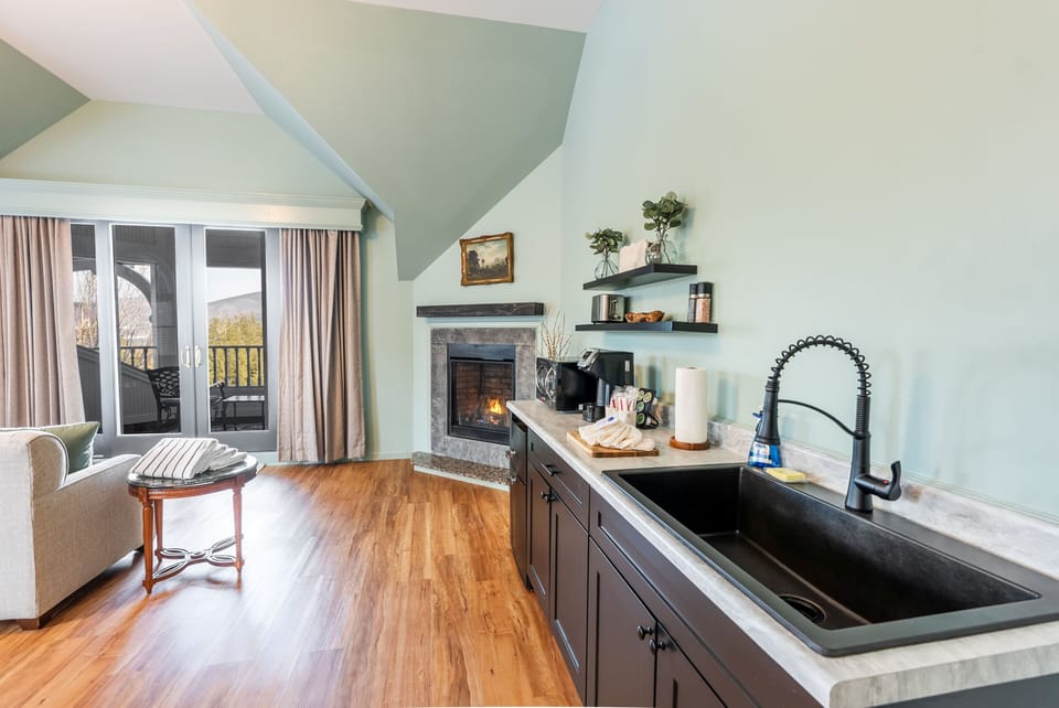 Kitchenette with Keurig, toaster, microwave, and mini fridge
