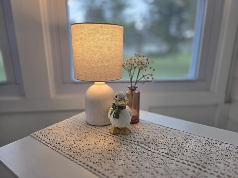 Guest welcome table with Wi-Fi information and a local area guide.