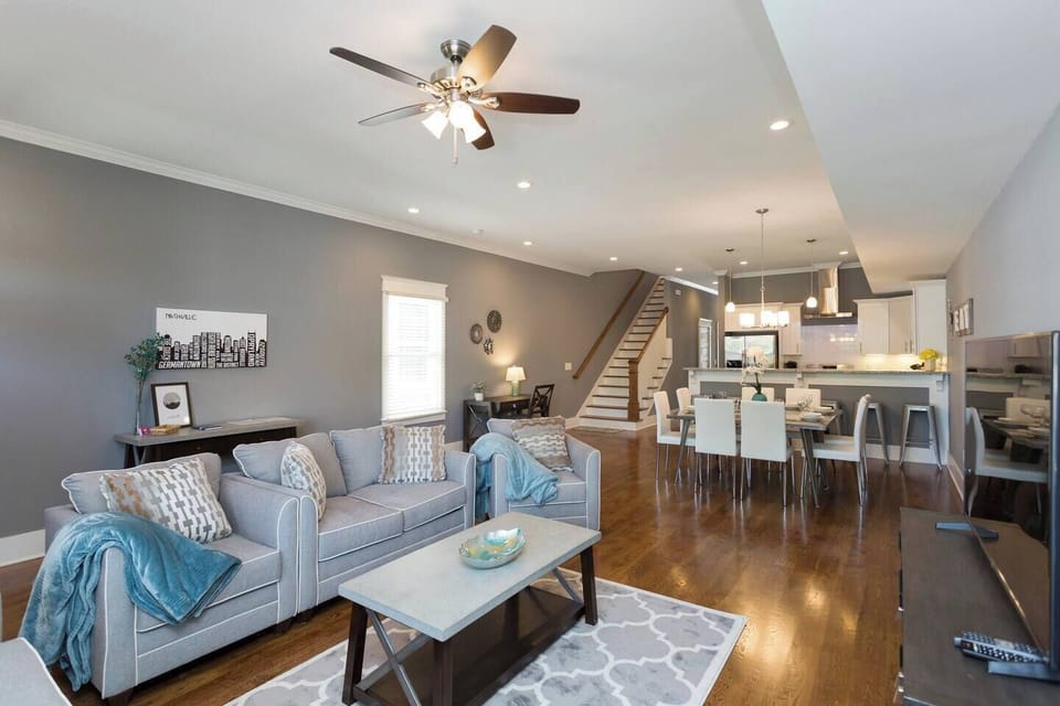 Living room has an open floor plan to the kitchen