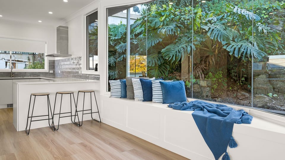 Sunlit breakfast nook overlooking the garden