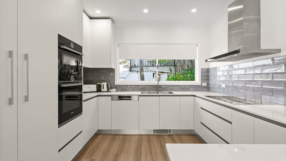 Sleek kitchen with generous preparation space