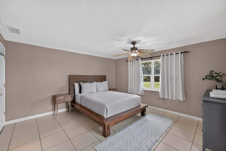 House, Multiple Beds, Pool View (Shingle Creek Poolside Retreat) | 4 bedrooms, individually decorated, individually furnished, bed sheets