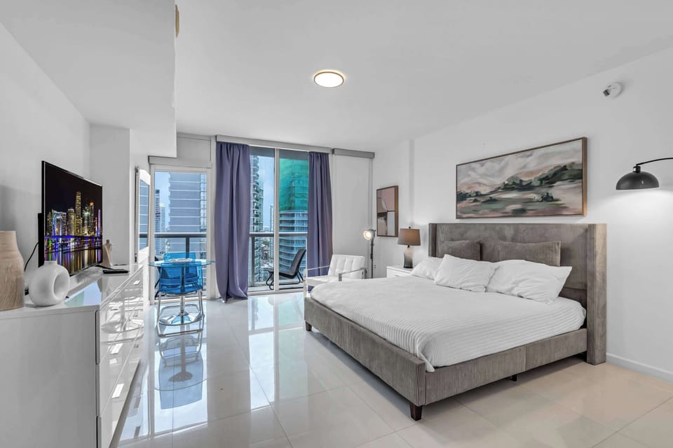 Unwind in the plush queen bed & stream your favorites on the smart TV​