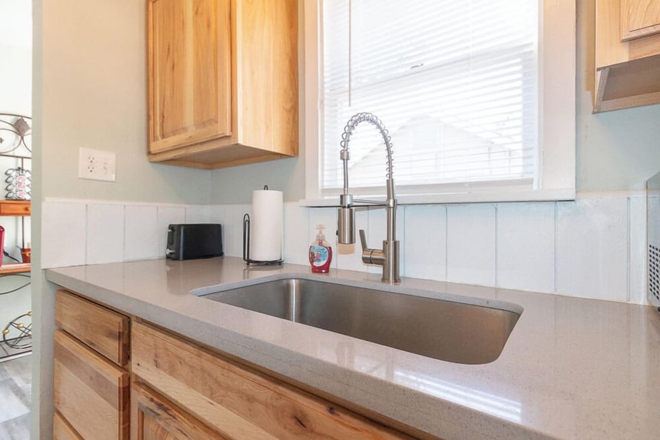 Modern finishes, natural light, and all the essentials make cooking a breeze.