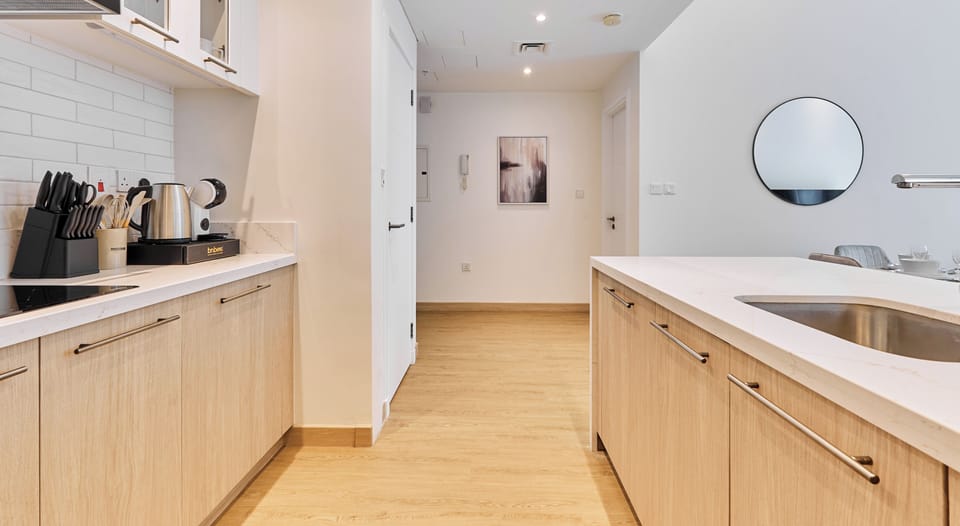 Superior Apartment, Partial Lake View | Private kitchen | Espresso maker, coffee/tea maker, electric kettle