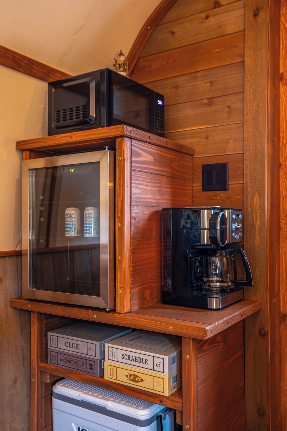 Coffee station, beverage fridge, microwave, cooler, and games for an easy couples getaway.