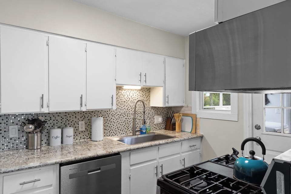 Cook up fresh catches on the gas range, with granite counters, a deep sink, and full cook's tools ready to go.