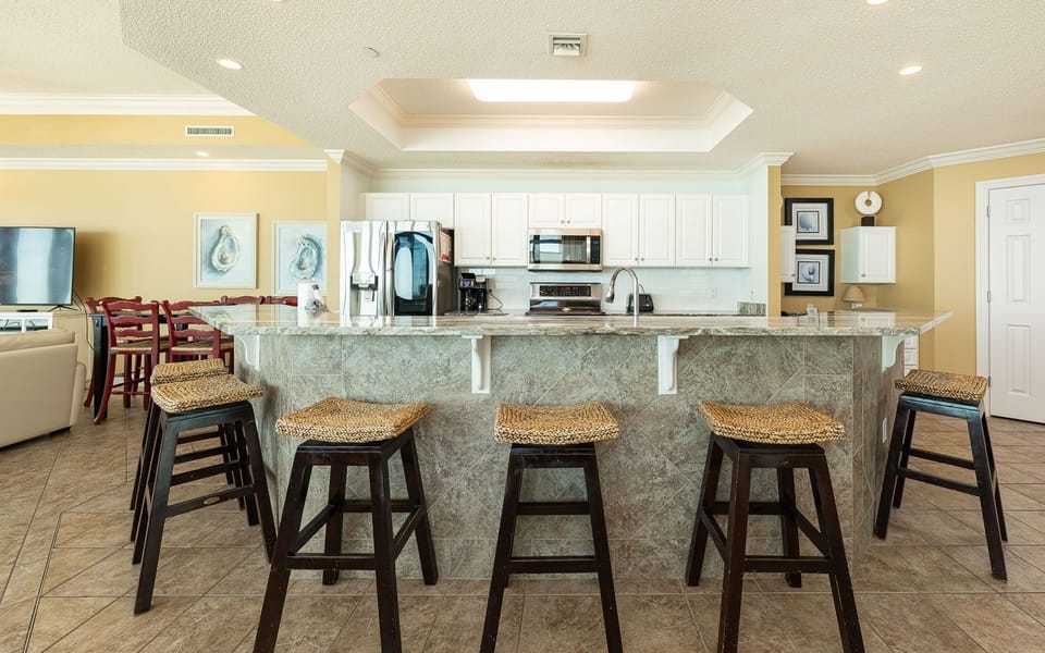 Condo, 4 Bedrooms | Private kitchen | Coffee/tea maker, fridge, oven