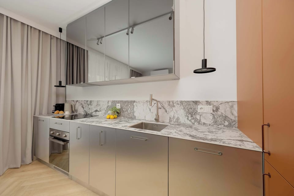 The fully equipped kitchenette includes everything you need for a home-cooked meal.