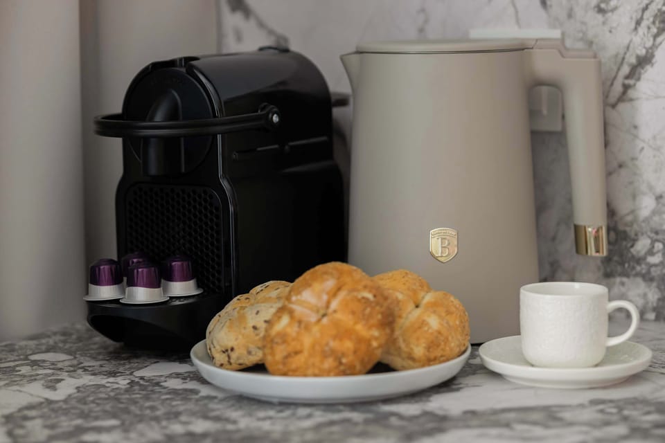 The kitchenette is designed to be practical and use space efficiently.
