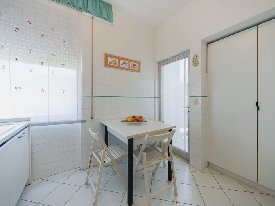 Furniture, Interior Design, Flooring, Floor, Ceiling, Kitchen & Dining Room Table, Table, Chair, Room, Lighting