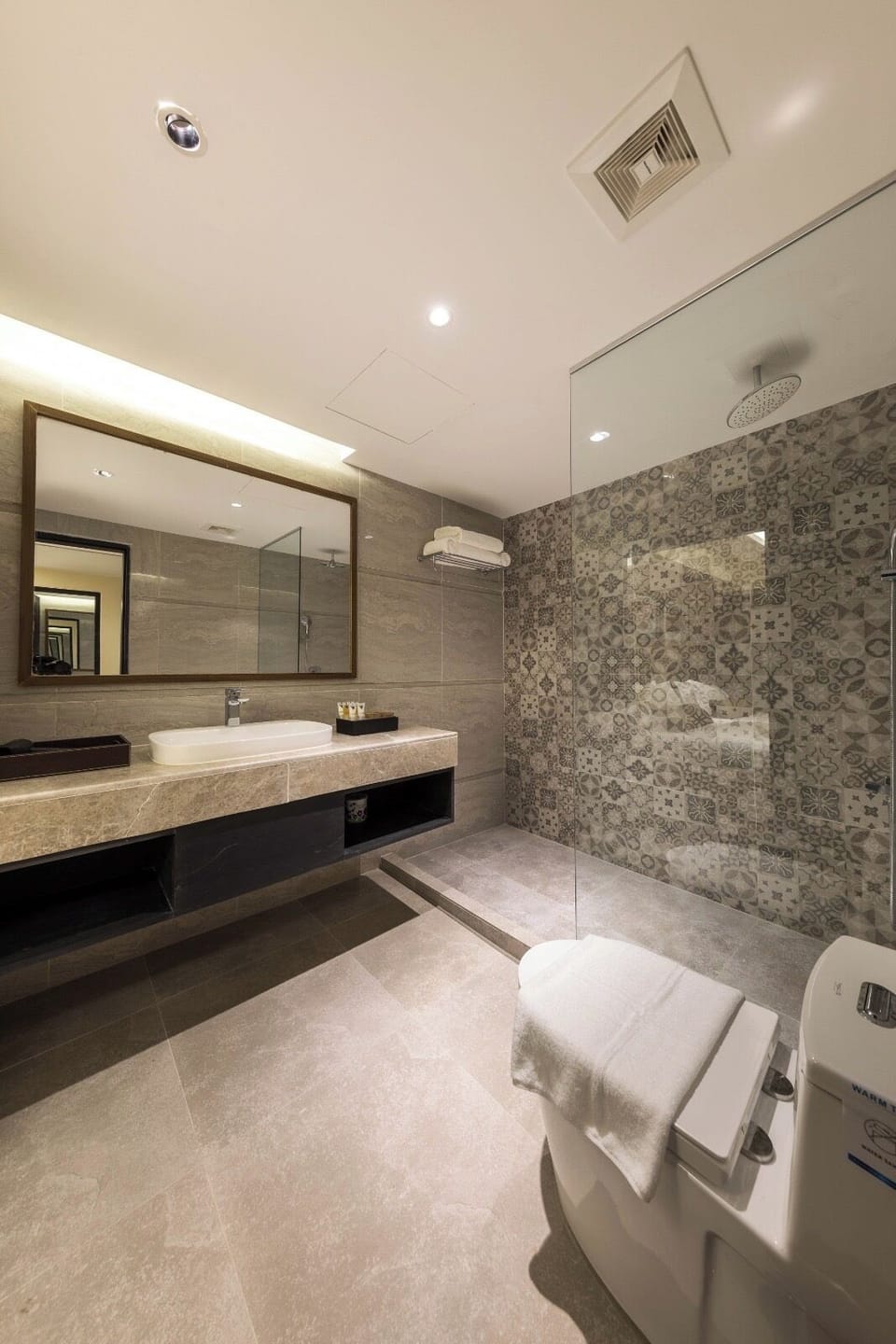Shower, free toiletries, hair dryer, slippers