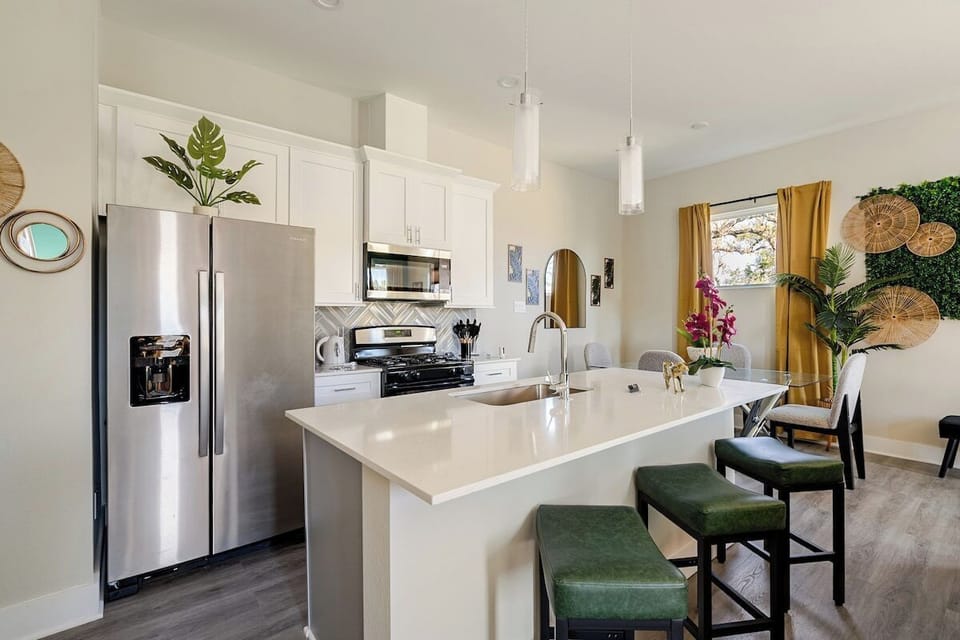 Kitchen: Modern elegance meets functionality with stylish seating and vibrant decor!