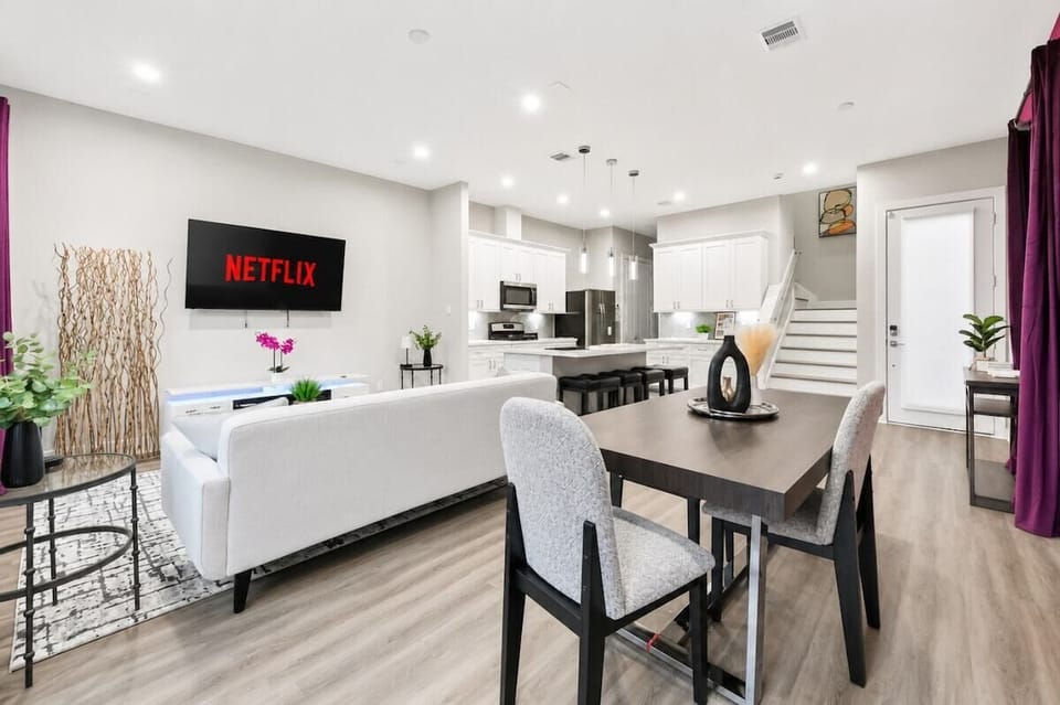 Living Room: Bright and stylish space perfect for movie nights with Netflix at your fingertips!