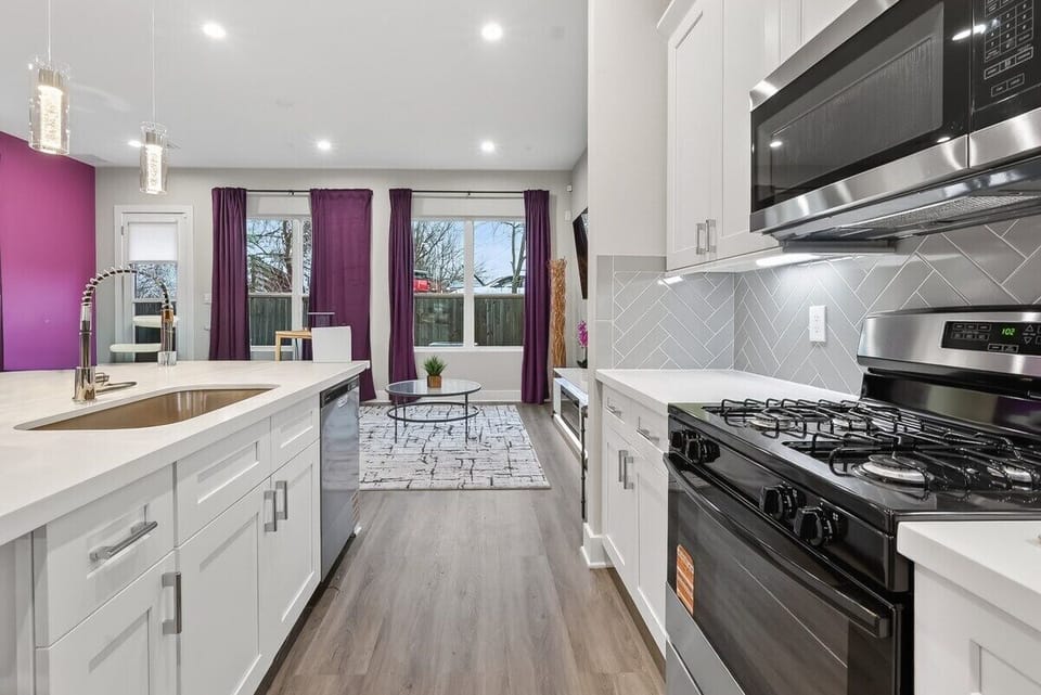 Kitchen Delight: Modern appliances meet vibrant decor for culinary adventures!