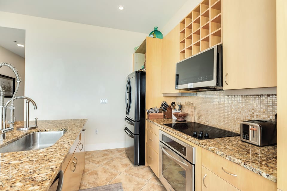 Fully equipped kitchen with stainless steel appliances
