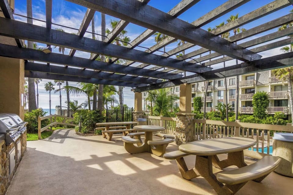 Property picnic tables with bbq grill