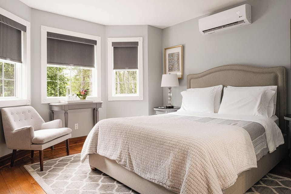 Deluxe Suite, 1 Queen Bed, Bathtub, Garden View | Premium bedding, blackout drapes, iron/ironing board (on request)
